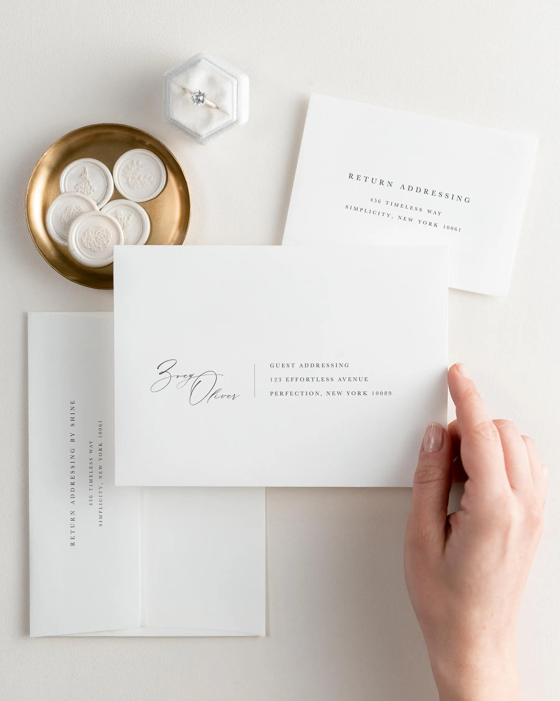 Zoey wedding invitation envelopes. The response envelope showcases our return addressing service, while the outer envelopes shows both guest and return addressing options.