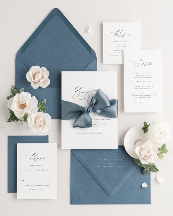 Wedding invitations with silk ribbon and blue envelope