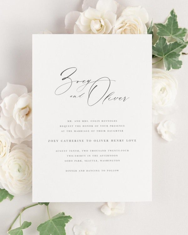 Zoey wedding invitation framed with dreamy florals.